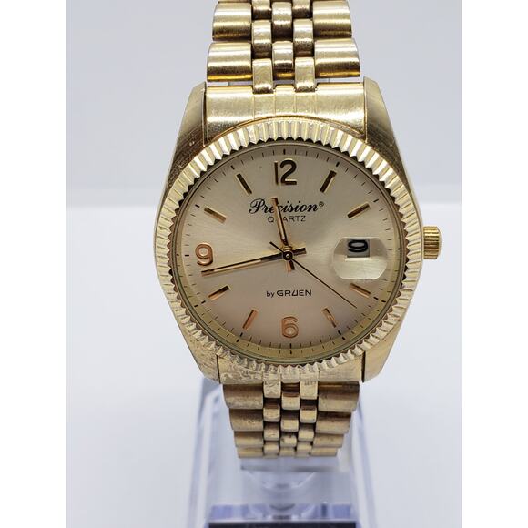 Precision Quartz by Gruen Men's watch. Gold face. GP5036, 098, PC32